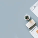 Financial documents and tools for Ontario tax credits 2025 on a work desk