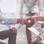 Two people shaking hands to represent personalized and trusted bookkeeping support