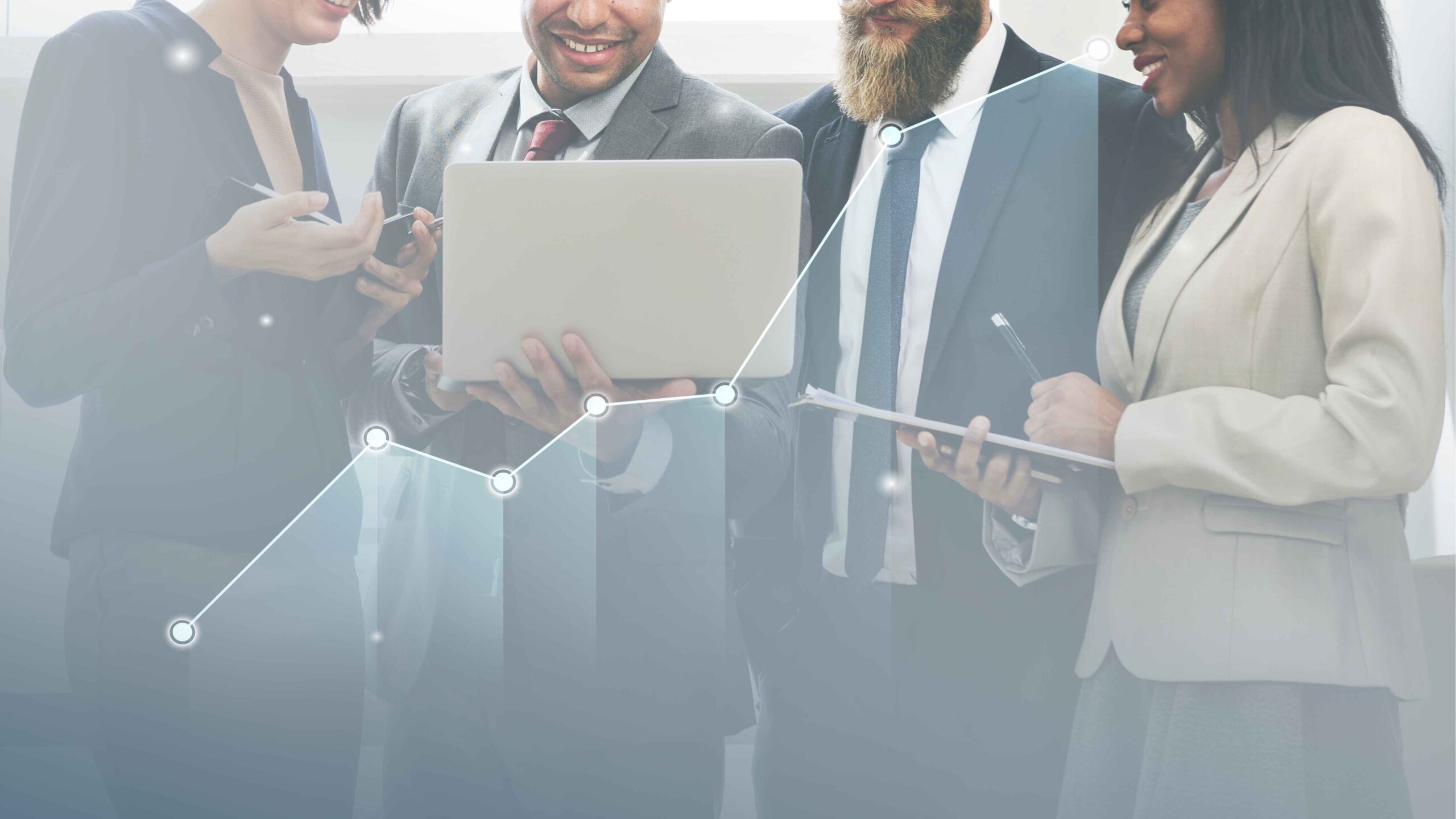 Team reviewing financial data on laptop with upward growth arrow, illustrating how bookkeeping services support business expansion in Canada.