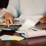 Small business owner tracking tax deductions in QuickBooks