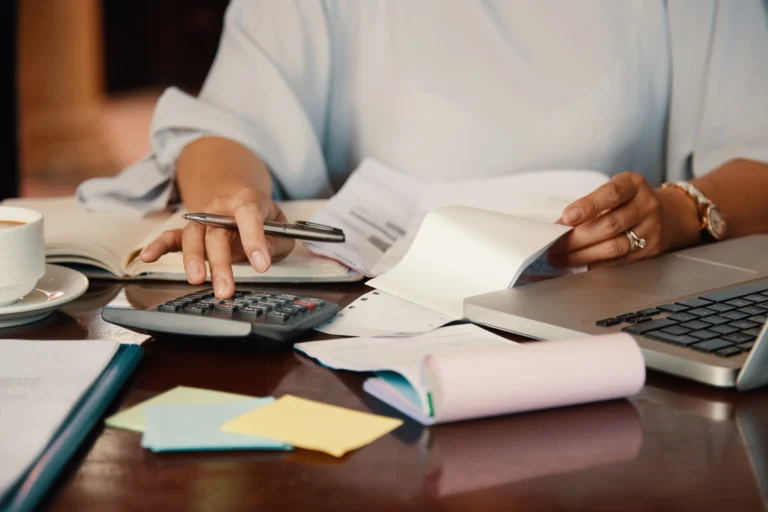 Small business owner tracking tax deductions in QuickBooks