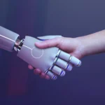 Robotic shaking hands with a human representing QuickBooks automation