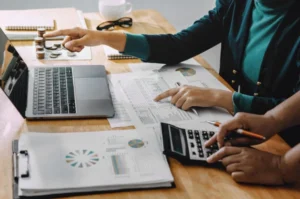 Bookkeeper calculating numbers.